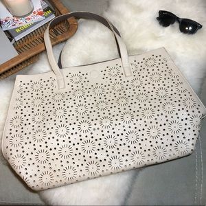 Laser cut vegan leather tote